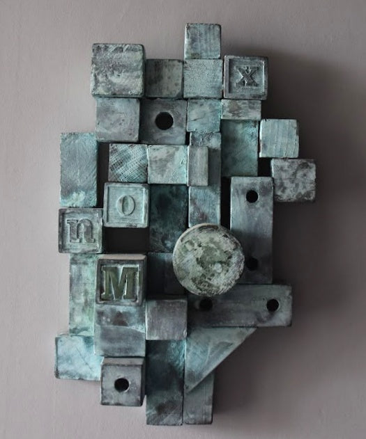 Wooden wall Construction from found objects with verdigris patina. 2020