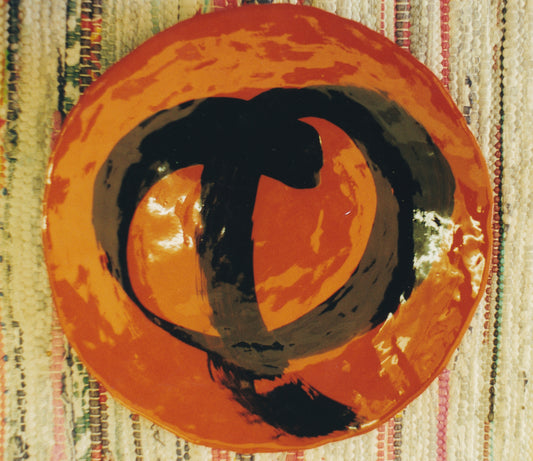 Glazed earthenware plate 1990's