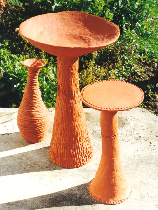 Birdbath , table and wonky pot. Destroyed Christchurch earthquakes